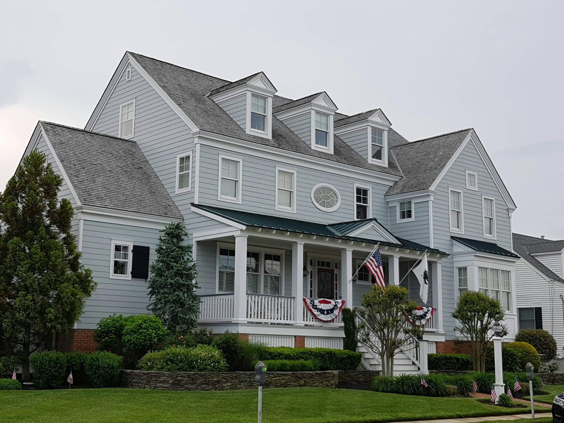 Light-blue clapboard siding on a New England home